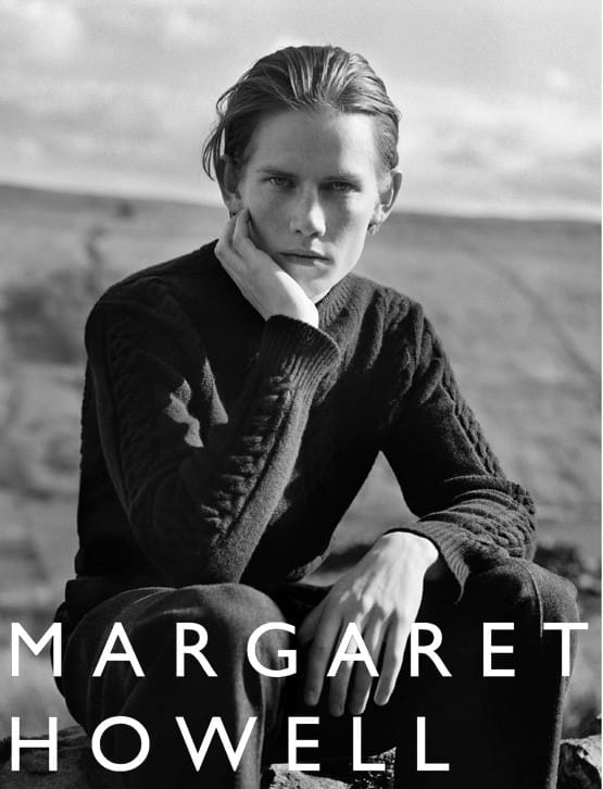 Gustav Frich seated in a black cable-knit Margaret Howell sweater for the Autumn/Winter 2016 campaign.