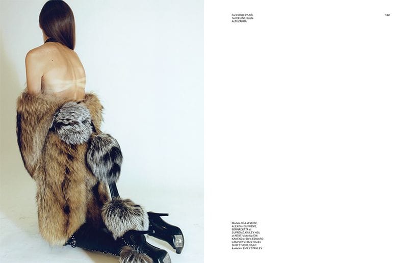 Closing 108 Big Optics spread with a model wrapped in a fur garment, black gloves and platform shoes.