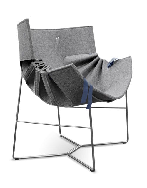 Front three-quarter view showing the Bufa Chair’s pleated felt sides and blue ribbon tie.