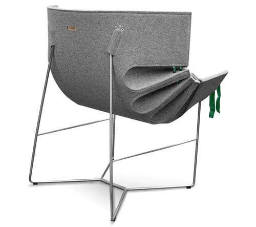 Rear three-quarter view of the Bufa Chair showing folded felt pockets, frame and green ribbon ties.