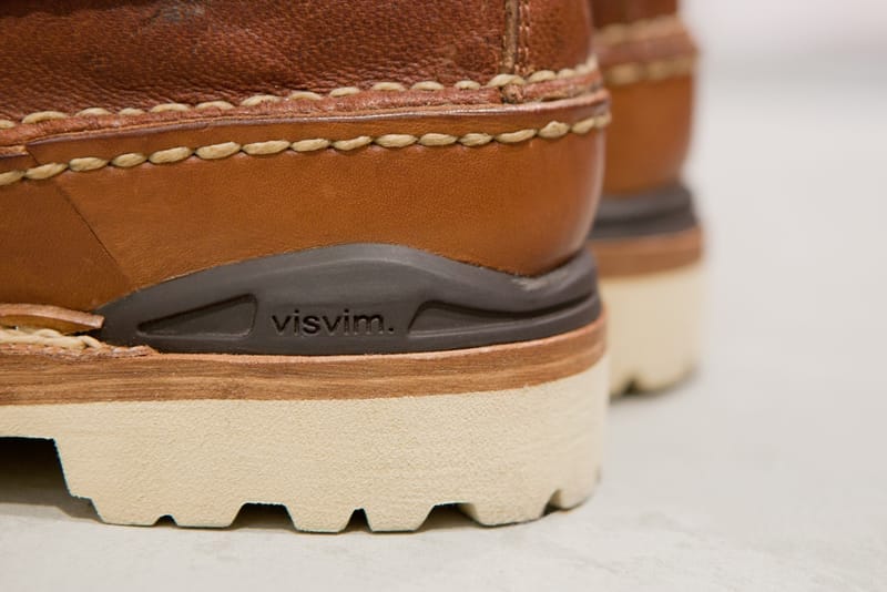 Close view of hand stitching, the visvim TPU heel stabilizer and cream Vibram outsole on the Grizzly Boots Mid-Folk.