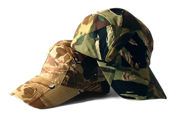 Futura Laboratories woodland and desert camouflage modified five-panel caps shown from the front.