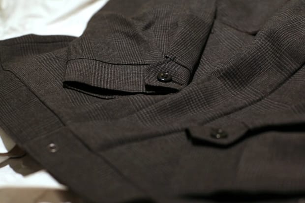 Close view of the cuff, buttons and gun-club-check fabric on the Homage to 221B jacket.
