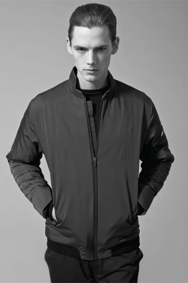 Johannes Niermann in a black zip-front bomber jacket from Stahl Corporation Fall/Winter 2012.