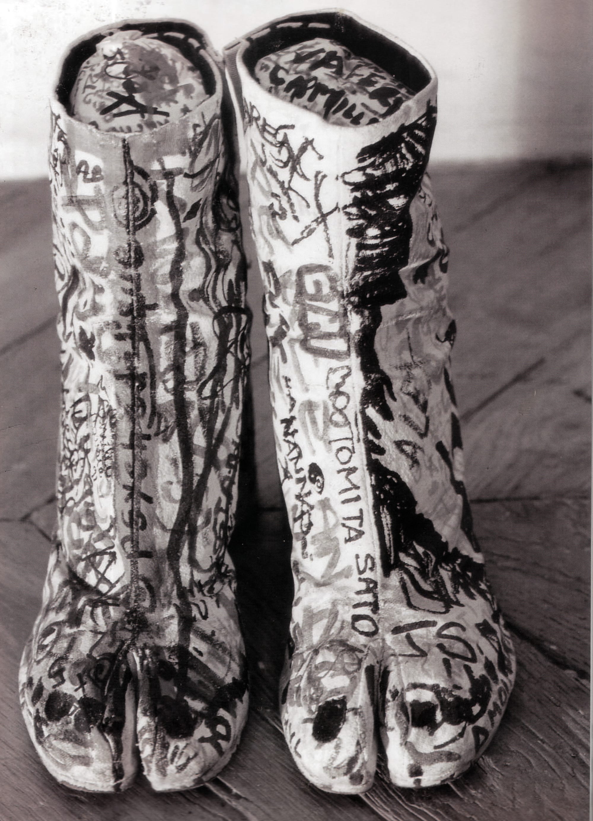 Maison Martin Margiela Spring/Summer 1990 Tabi boots with hand-tagged graffiti.