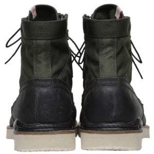 Rear view of a pair of black Visvim high-top boots.