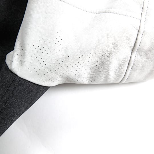 Perforated white lambskin sleeve detail on the visvim Windstopper Varsity Jacket.