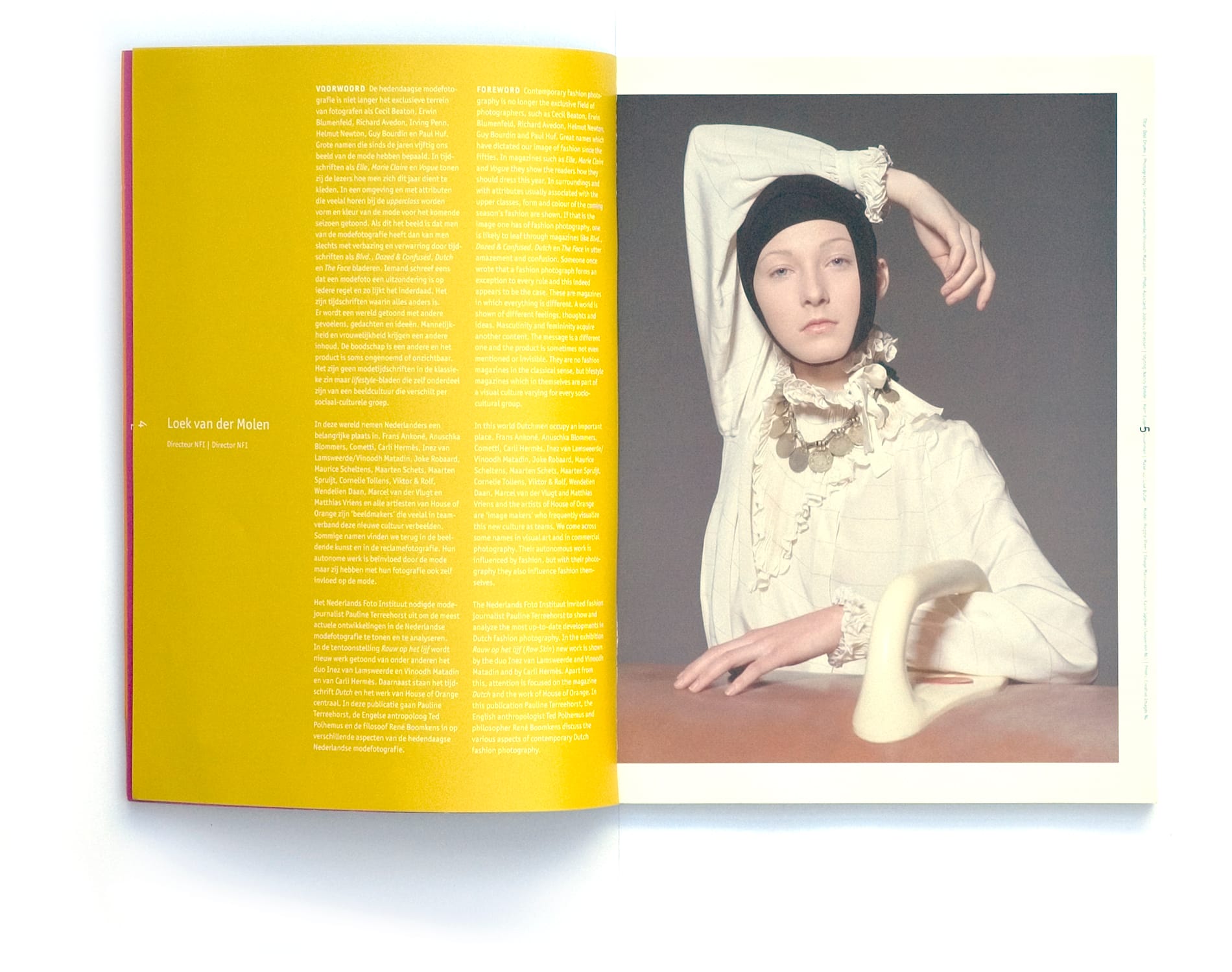 Rauw op het lijf foreword spread with a model in a black head covering and cream ruffled outfit.