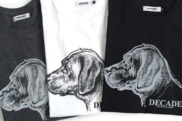 UNTOLD grey, white and black T-shirts with line-drawn dog-head graphics.