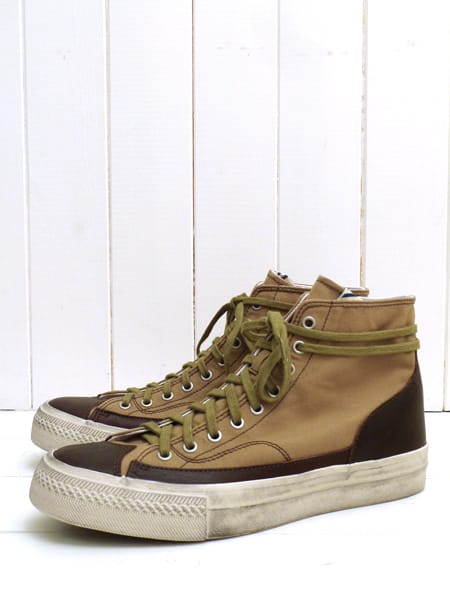 Khaki and brown visvim SKAGWAY ESTLIN sneakers in side profile.