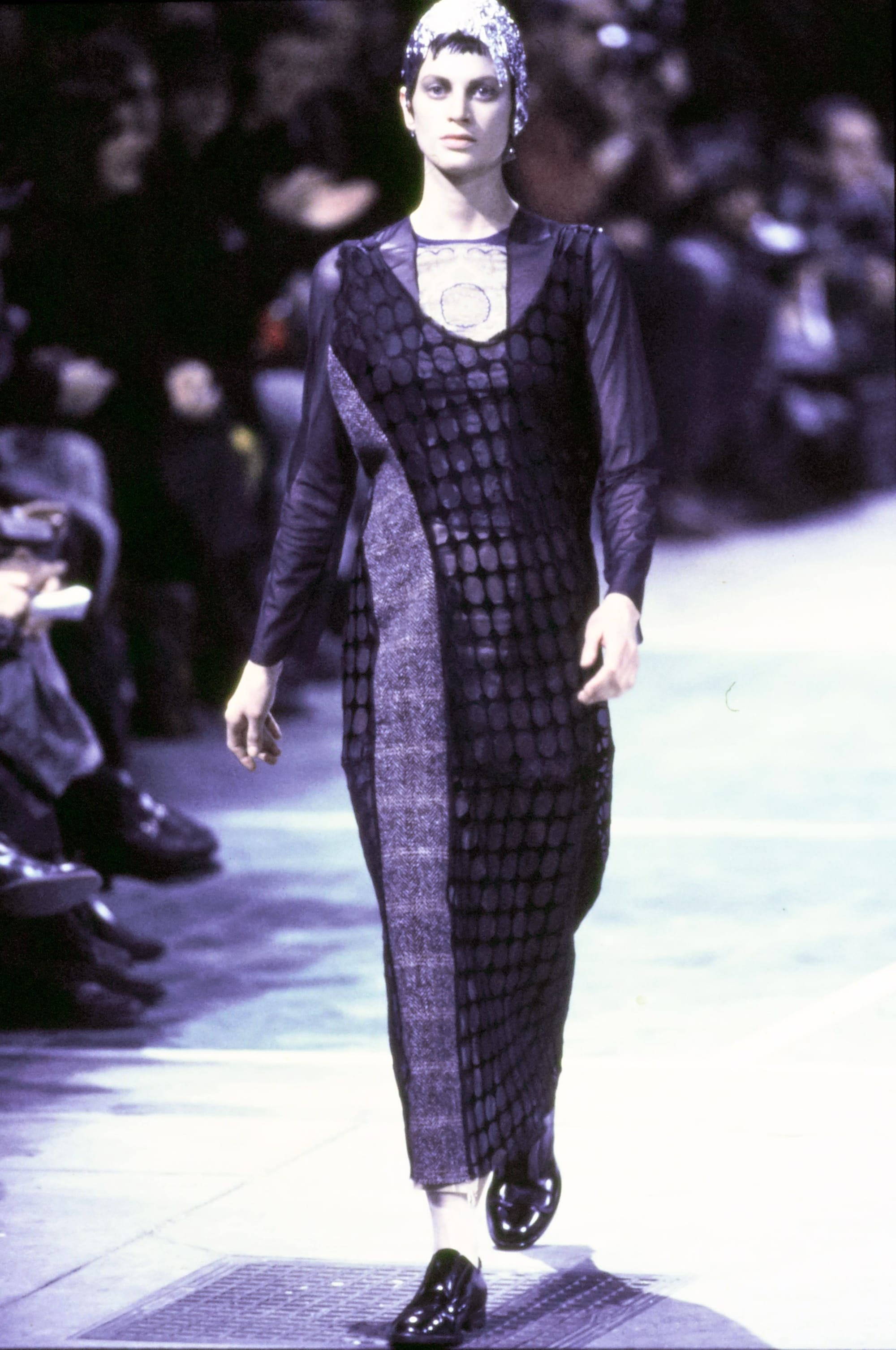 Comme des Garçons Fall 1993 Ready-to-Wear runway look 11: dark checked column dress.