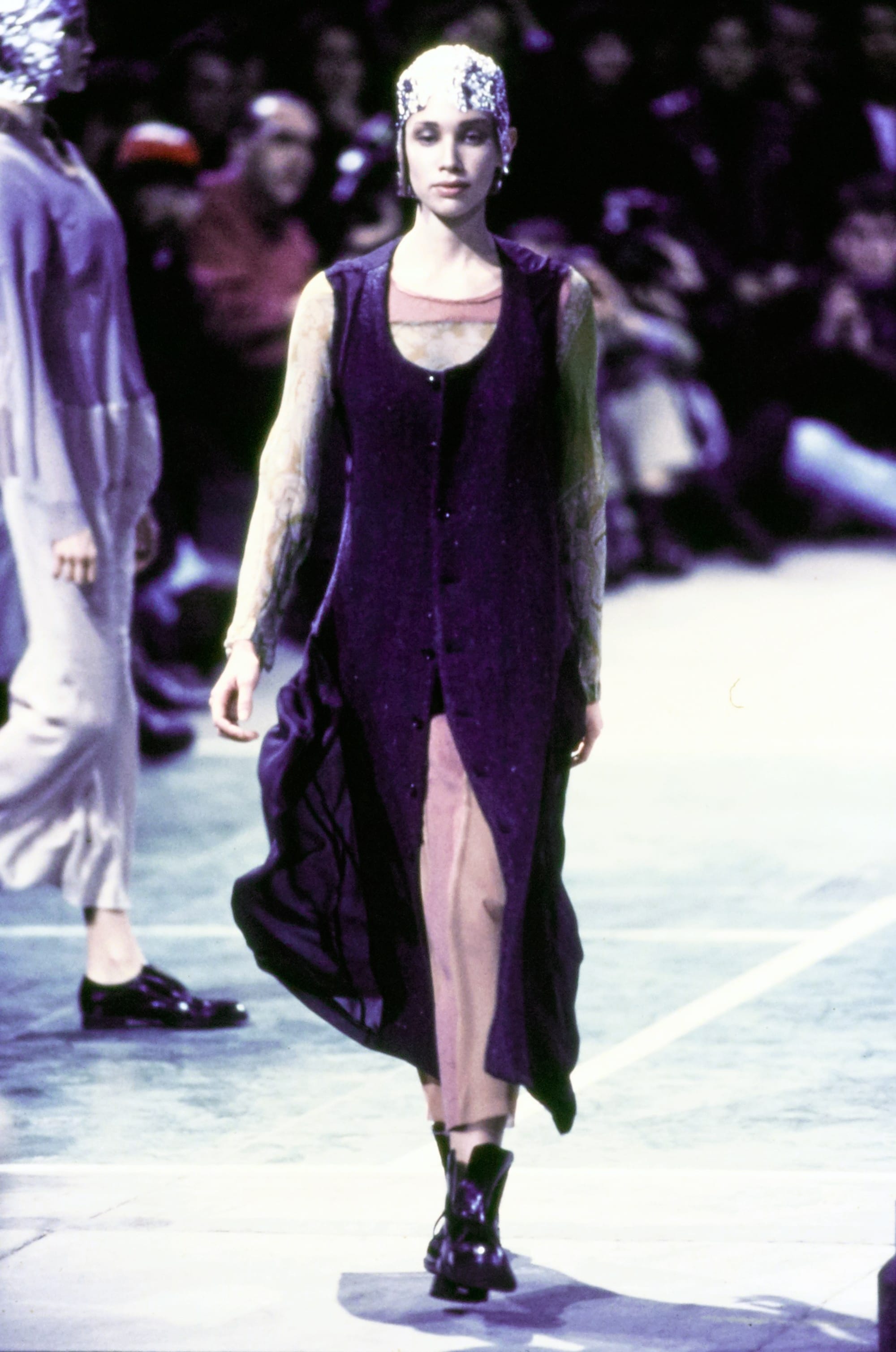 Comme des Garçons Fall 1993 Ready-to-Wear runway look 13: black sleeveless dress with a sheer draped overlayer.