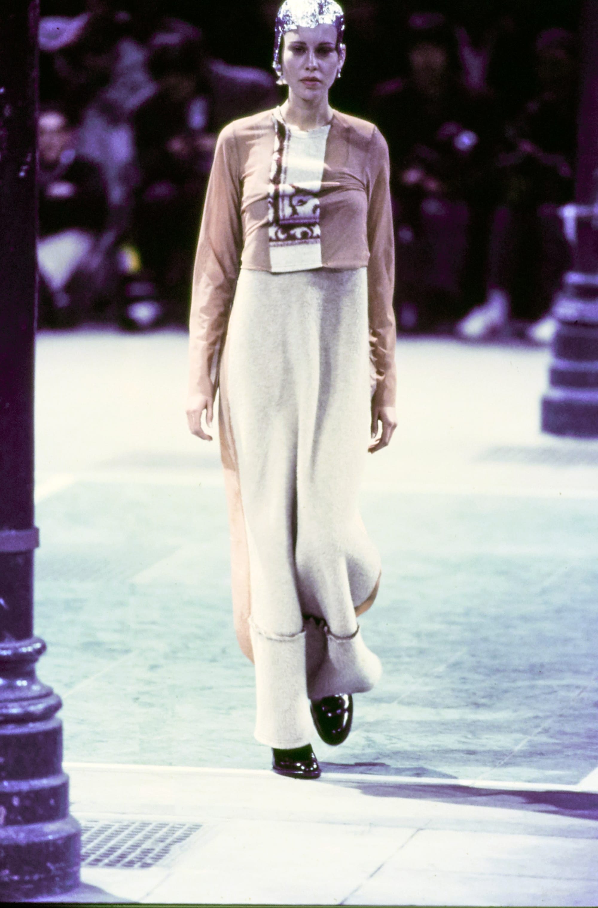 Comme des Garçons Fall 1993 Ready-to-Wear runway look 27: pale sleeveless column dress with a geometric chest panel.