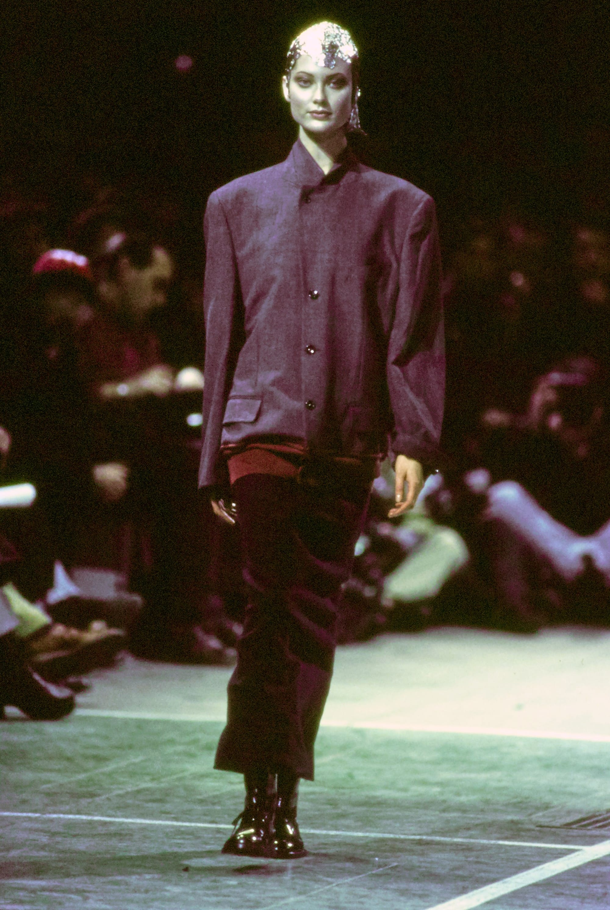 Comme des Garçons Fall 1993 Ready-to-Wear runway look 38: dark burgundy sweater and wide black trousers.