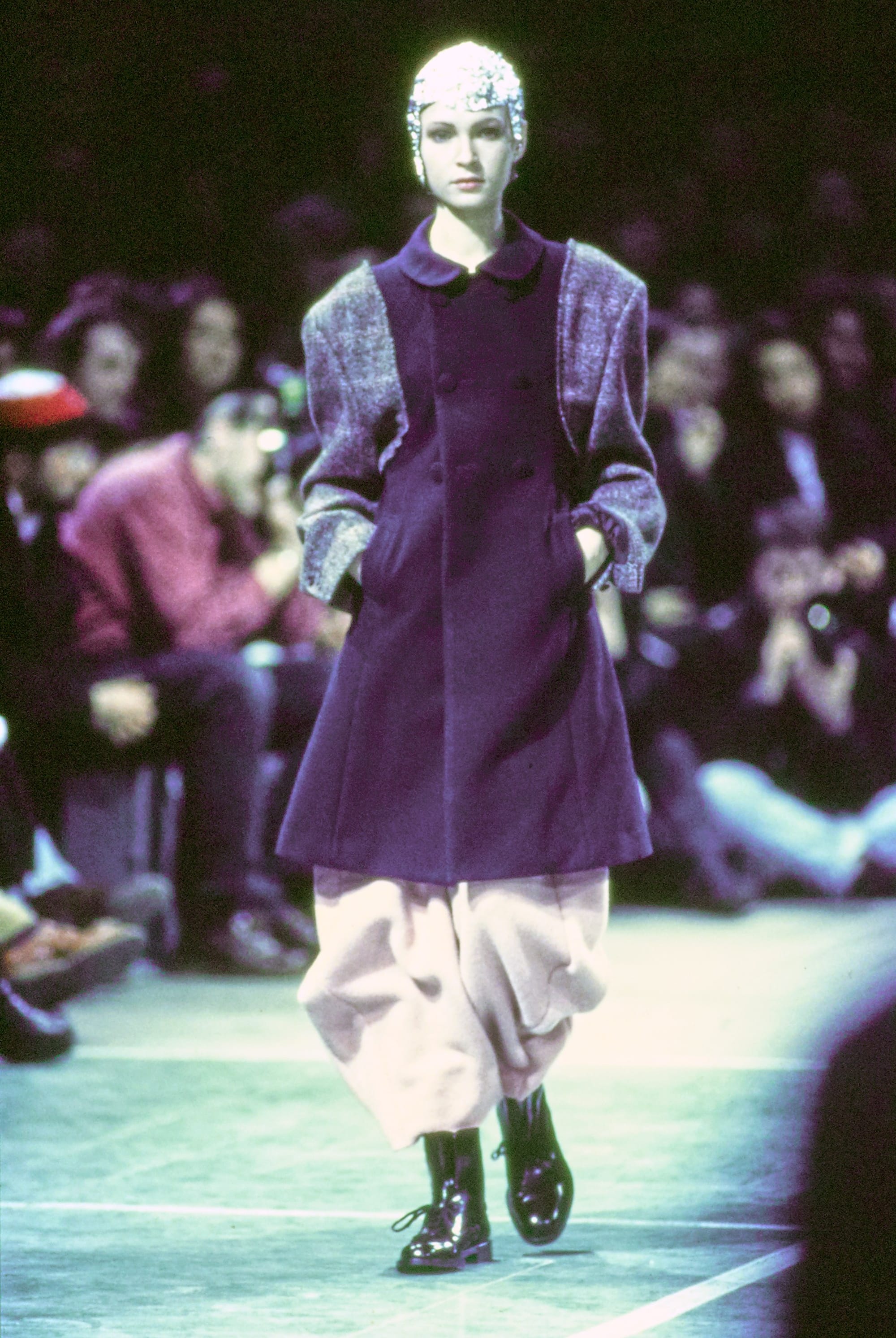 Comme des Garçons Fall 1993 Ready-to-Wear runway look 47: purple peplum jacket over a pale skirt.
