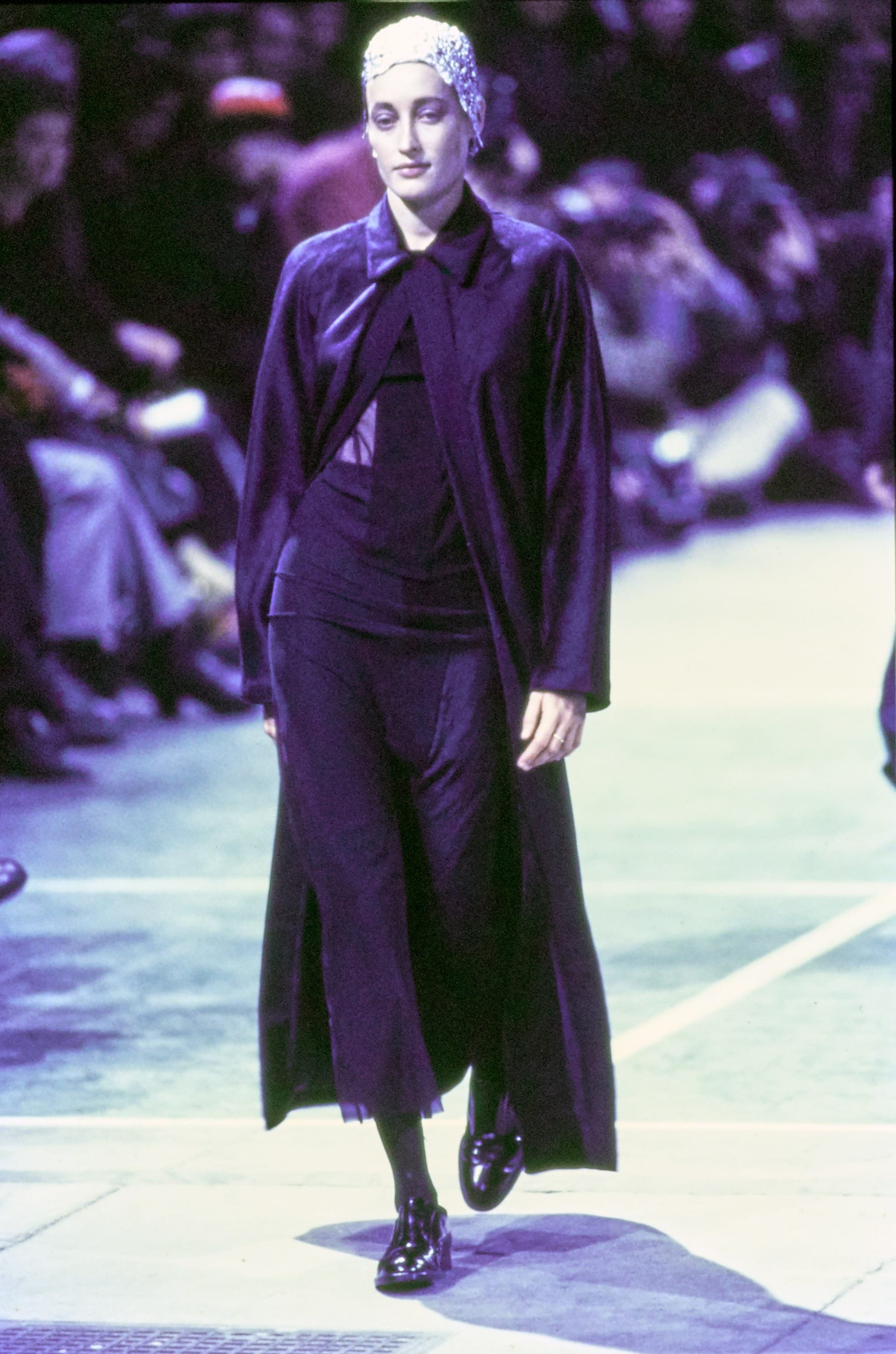 Comme des Garçons Fall 1993 Ready-to-Wear runway look 53: dark purple long jacket and trousers.