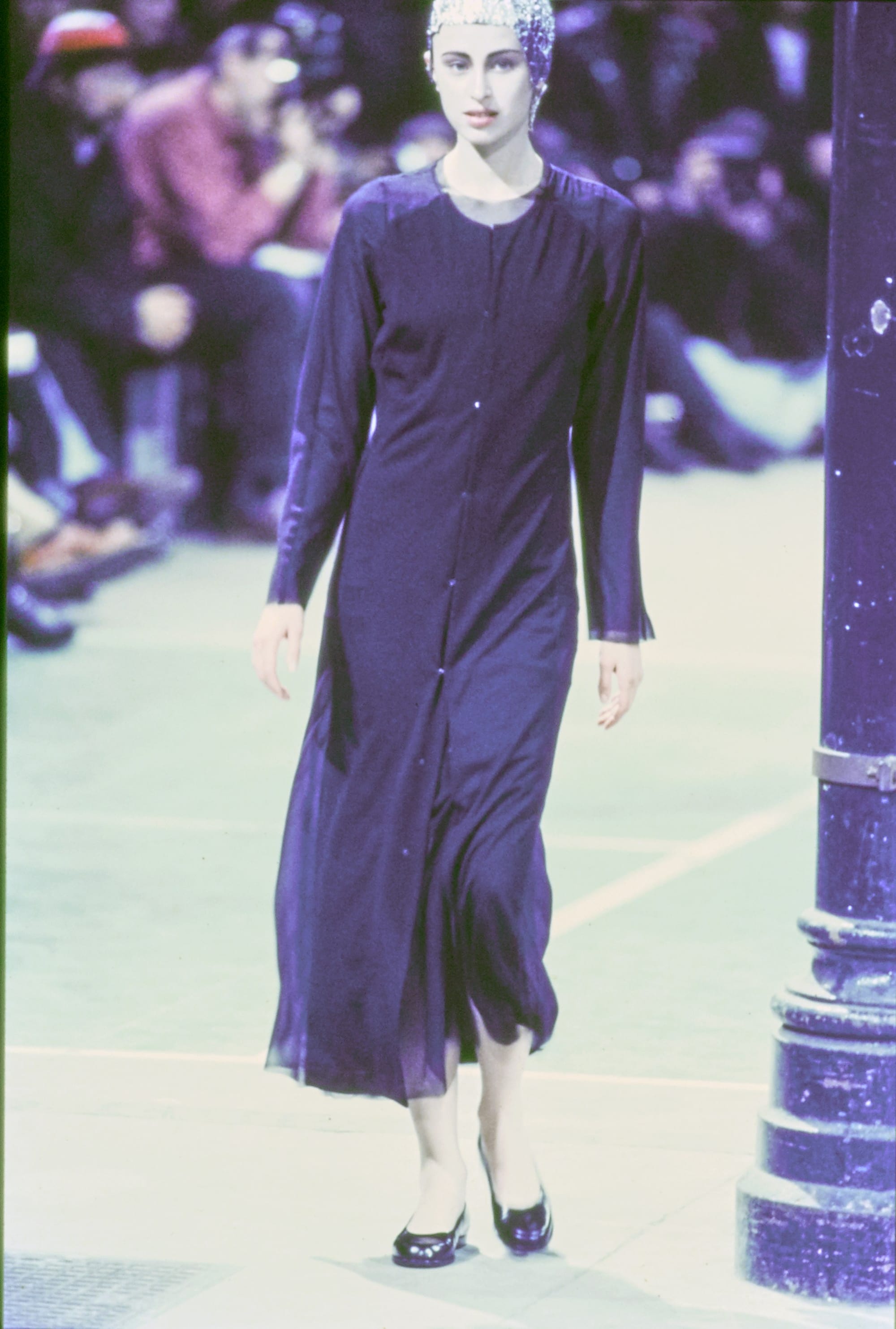 Comme des Garçons Fall 1993 Ready-to-Wear runway look 59: black long-sleeve dress with a sheer lower panel.