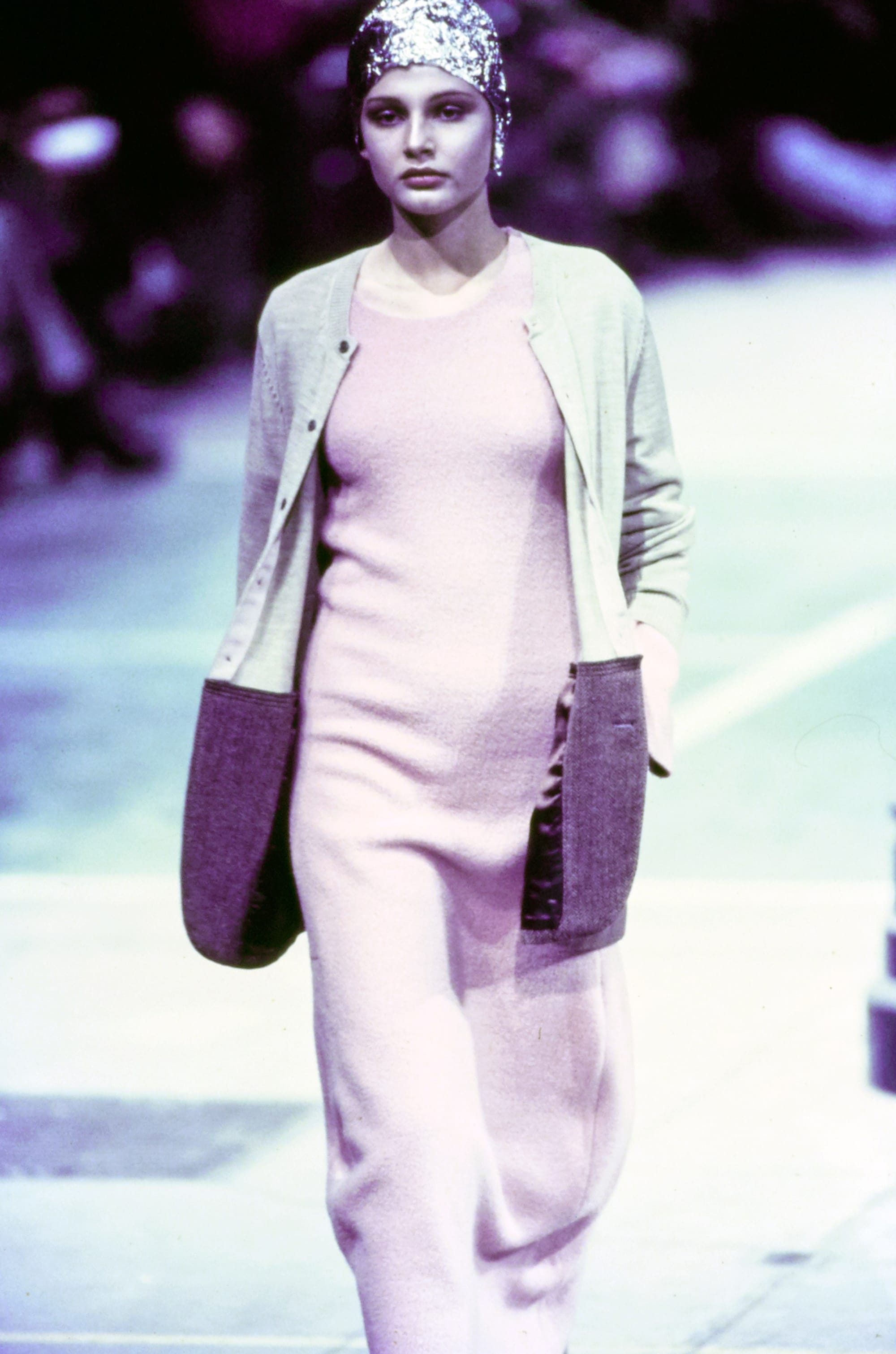 Comme des Garçons Fall 1993 Ready-to-Wear runway look 6: pale pink sleeveless tunic and wide trousers.