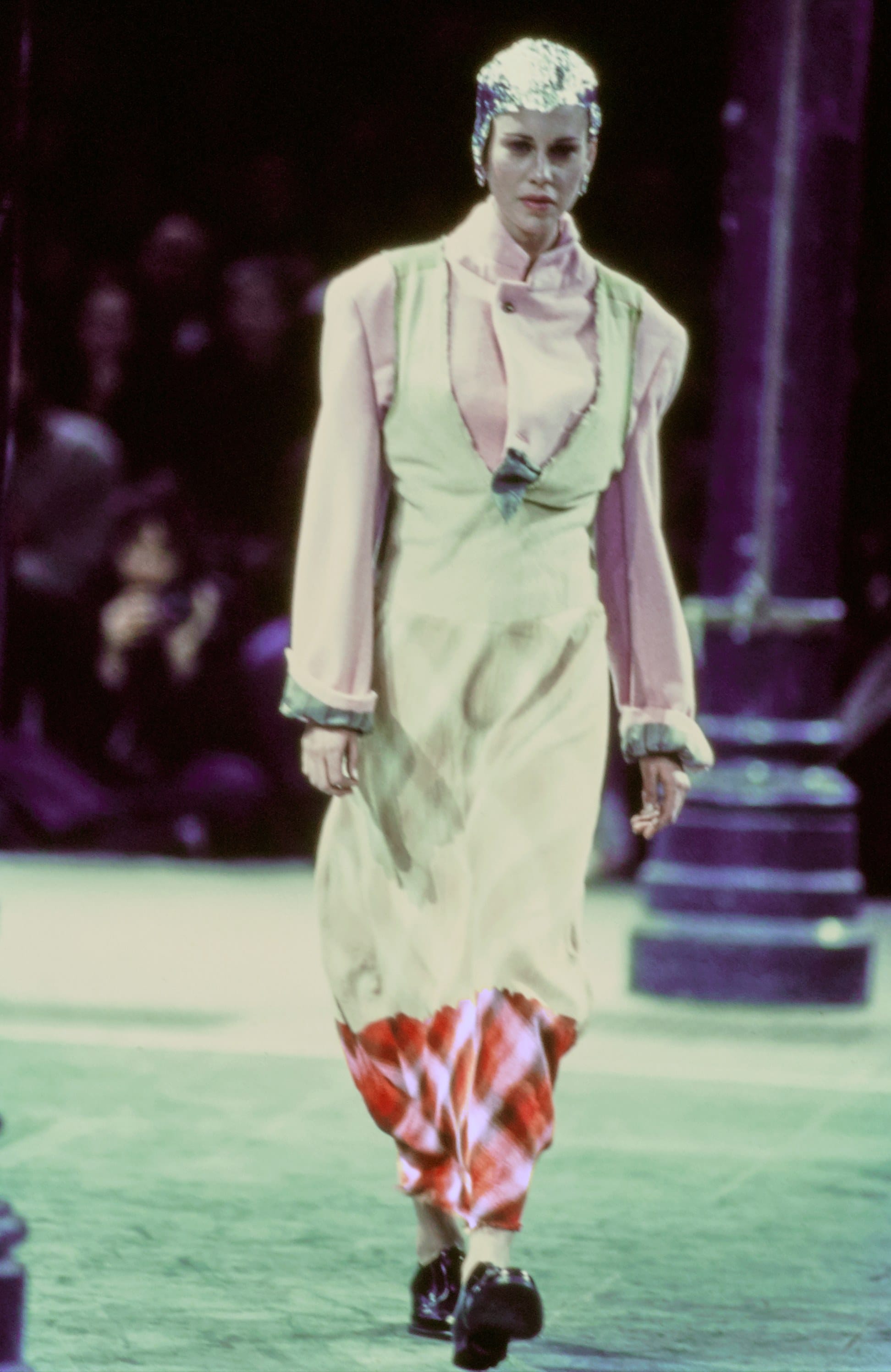 Comme des Garçons Fall 1993 Ready-to-Wear runway look 64: pale pink tailored jacket over orange plaid trousers.