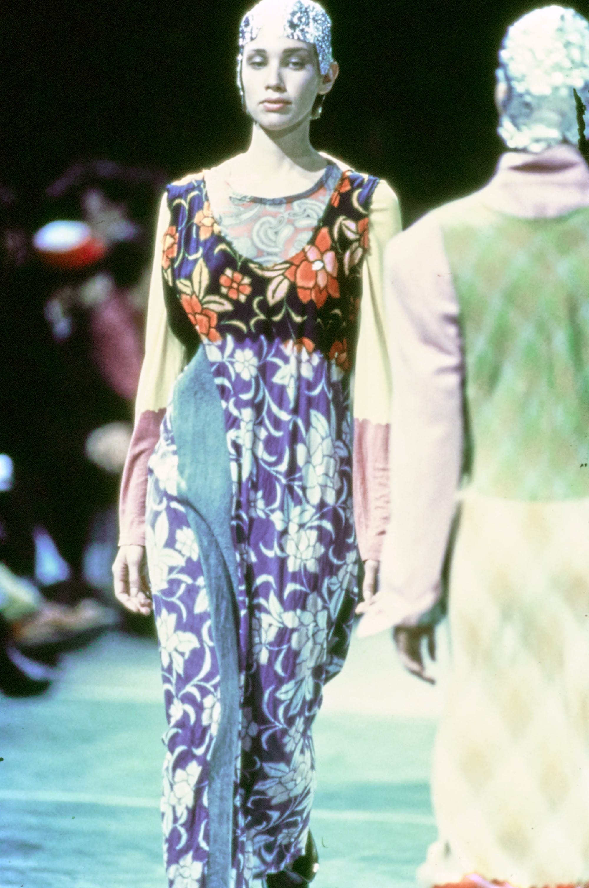 Comme des Garçons Fall 1993 Ready-to-Wear runway look 65: colourful floral dress with black trousers.
