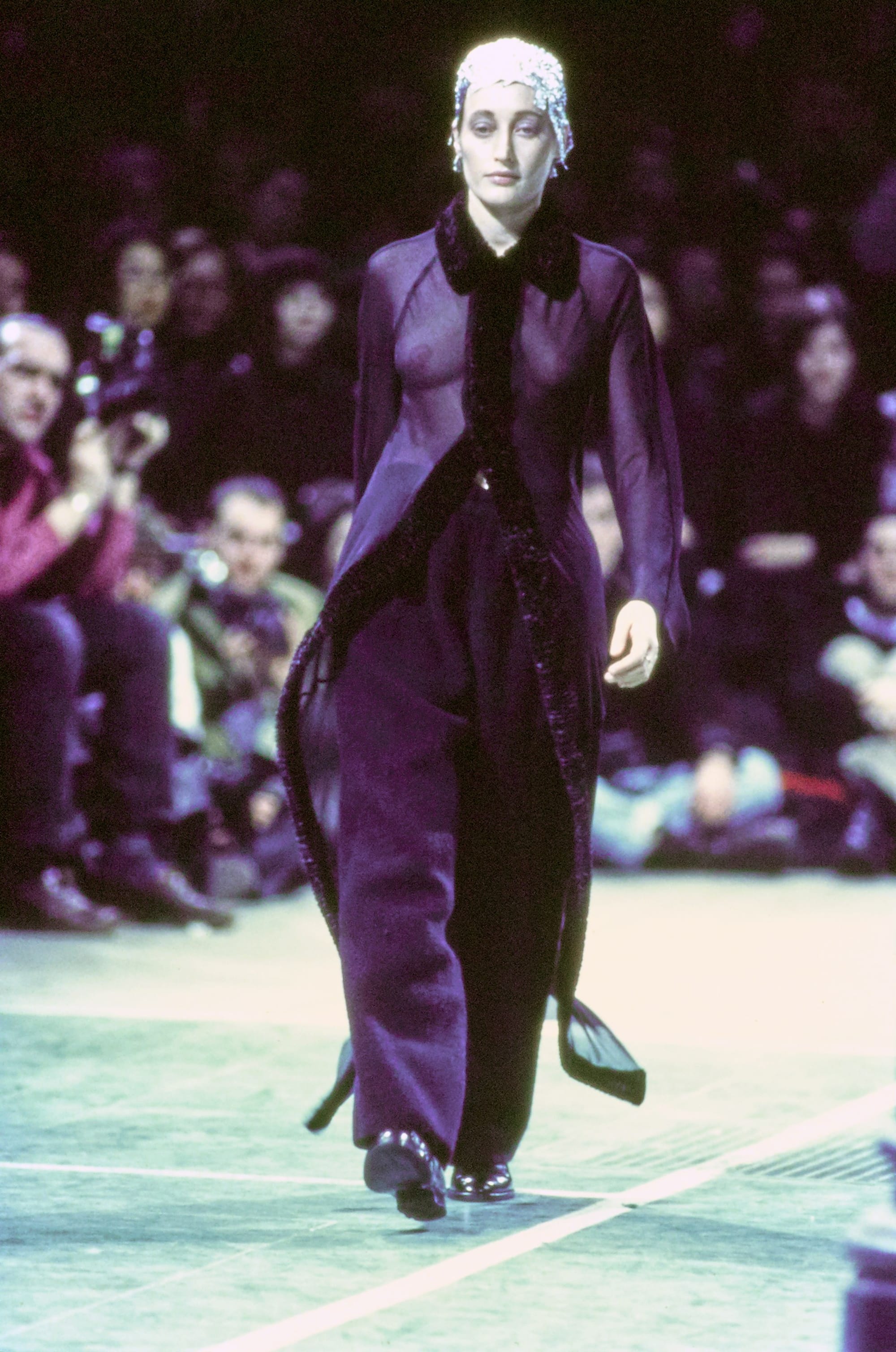 Comme des Garçons Fall 1993 Ready-to-Wear runway look 70: black draped dress over trousers.