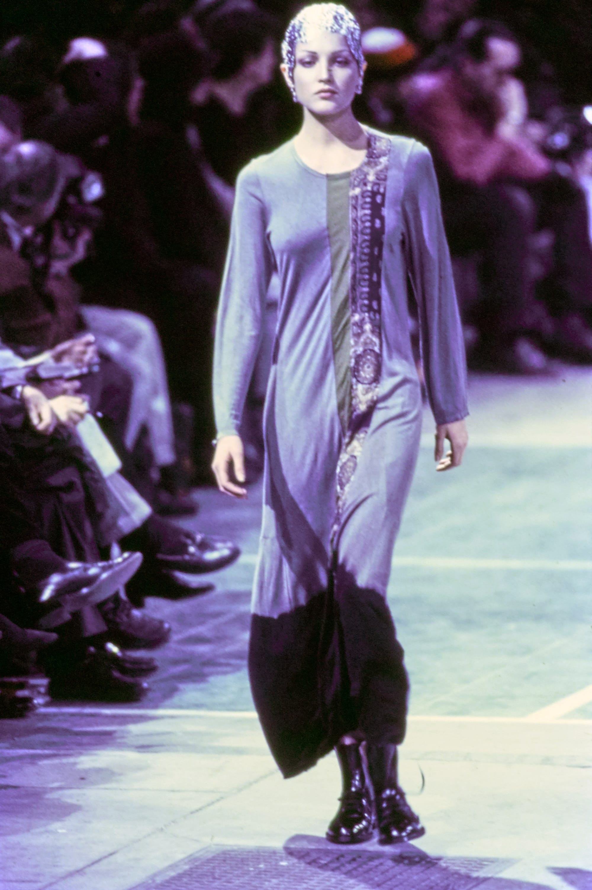 Comme des Garçons Fall 1993 Ready-to-Wear runway look 77: purple sleeveless top with a black draped skirt.