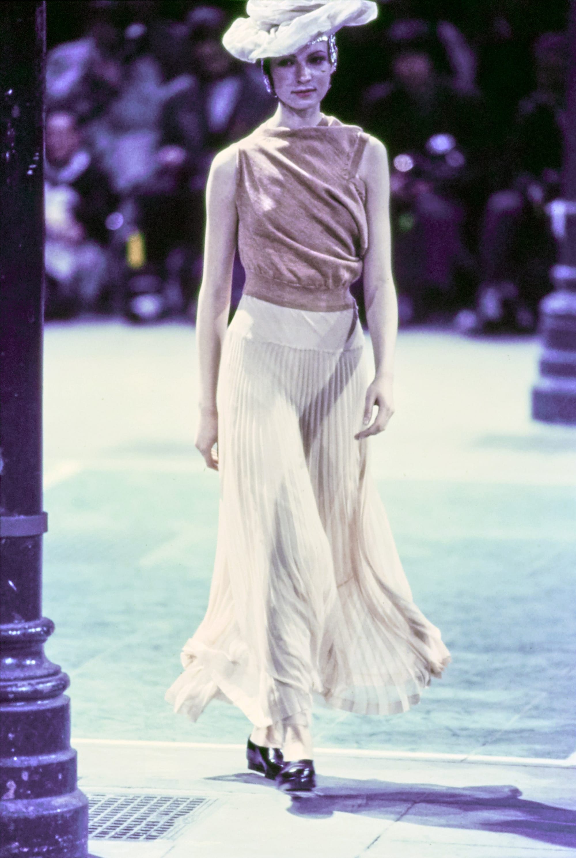 Comme des Garçons Fall 1993 Ready-to-Wear runway look 84: brown top with a pale flowing skirt.