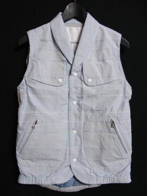 white mountaineering vest