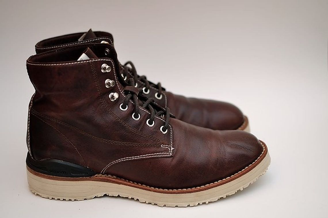 Visvim Virgil brown leather boots with cream wedge sole.