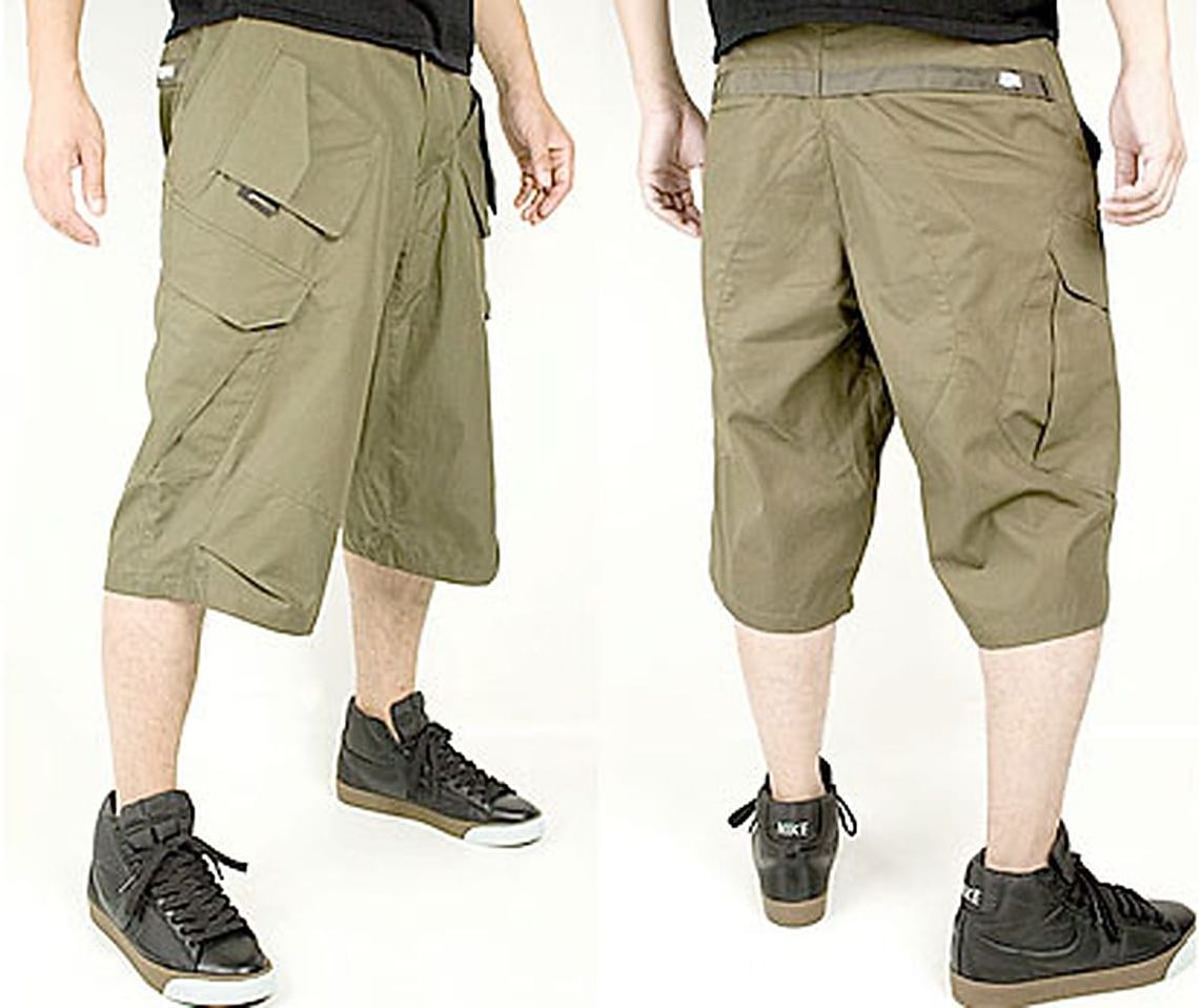 Acronym 2008 olive cargo shorts with oversized pockets.