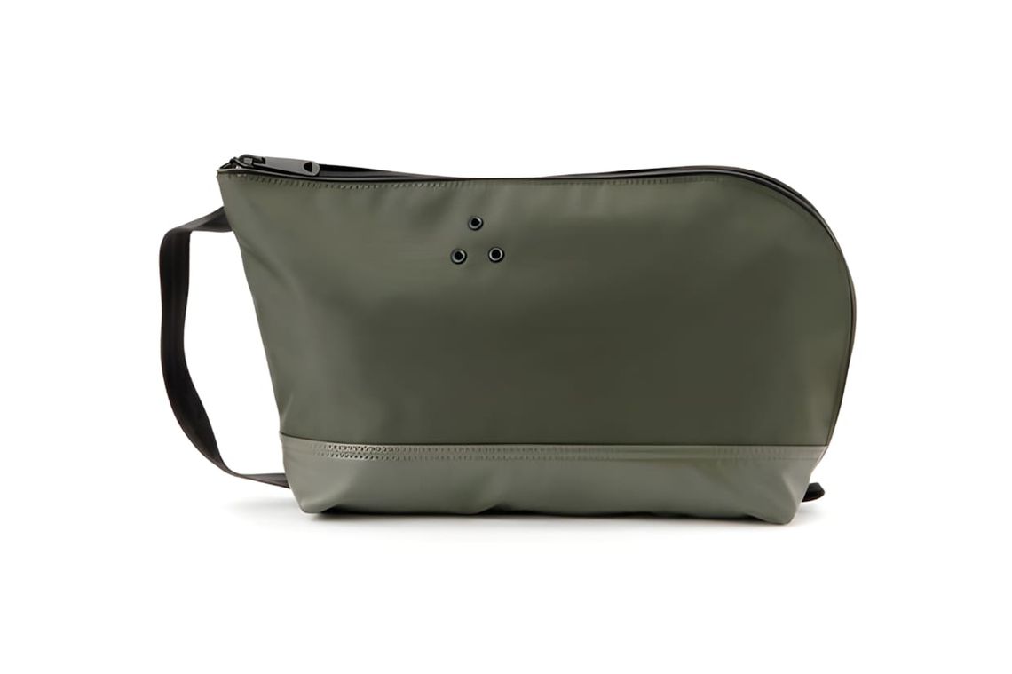 Porter Gripper Pouch in olive green nylon with leather base panel, top zipper, and carry handle, on white background.