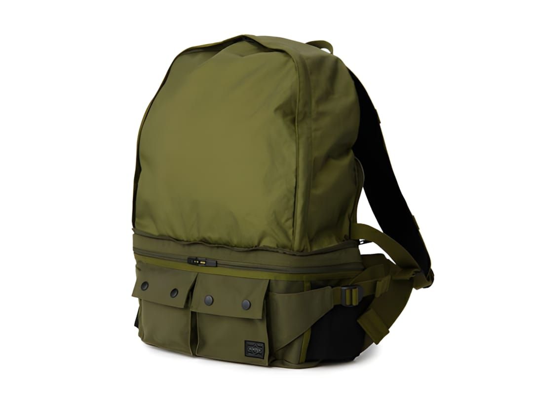 Porter Yoshida & Co. Force Day Pack in olive green nylon, three-quarter rear view on white background.