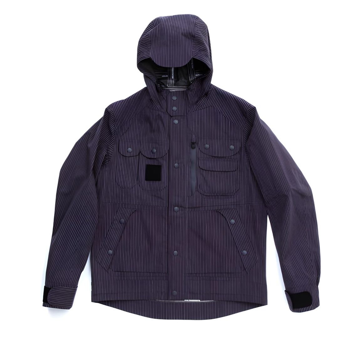 CP Company multi-pocket hooded jacket in dark grey ribbed nylon with snap-flap chest pockets and goggle hood, ghost mannequin