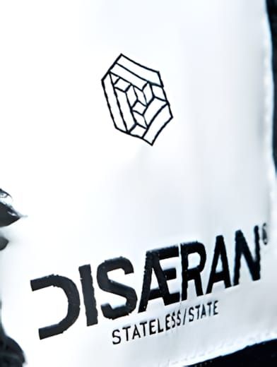 Editorial page from the DISÆRAN Fall/Winter 2011–12 lookbook, produced with United Arrows Beauty & Youth and Acronym