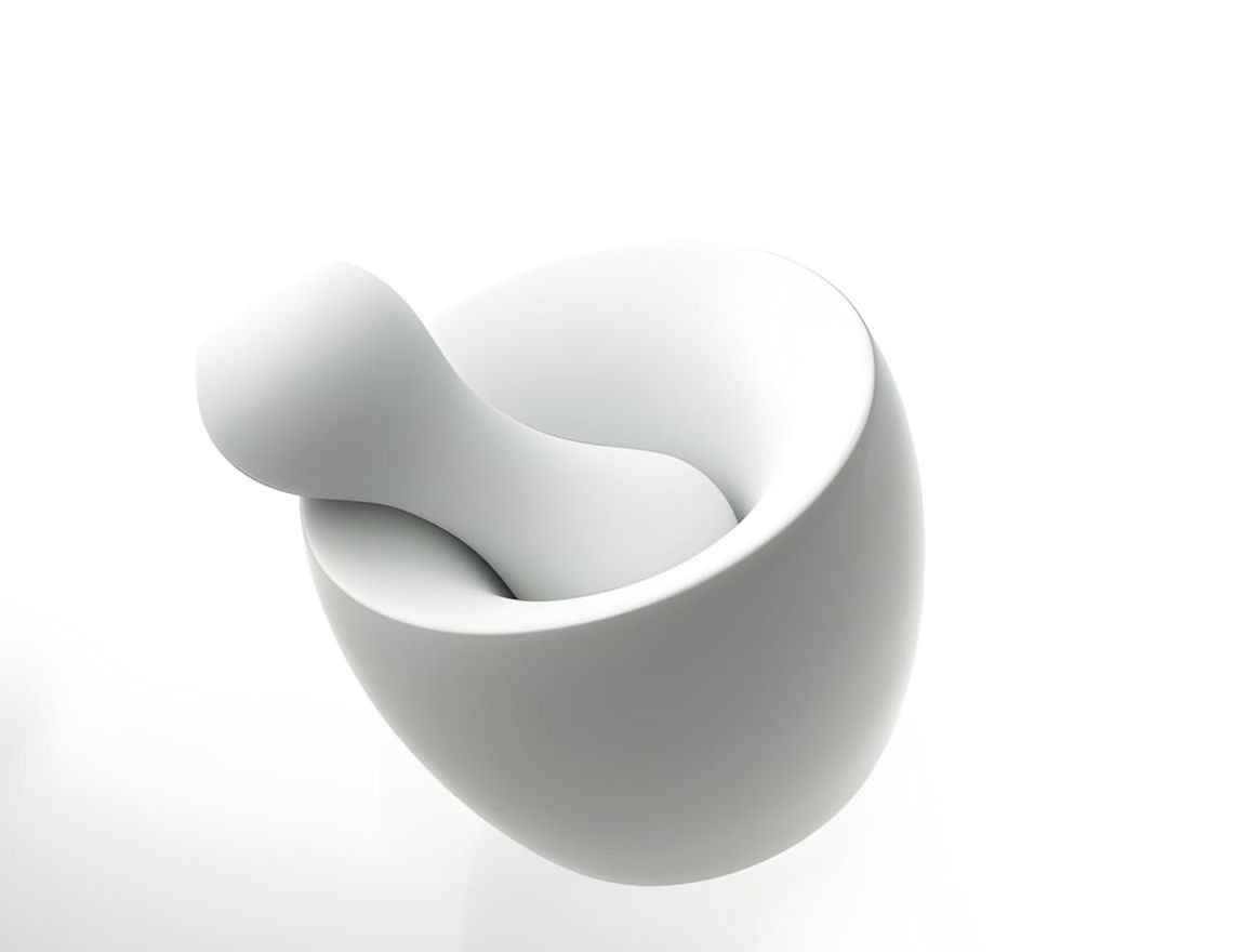 White Alessi Aroma mortar and pestle by Eero Aarnio, matte finish with rounded organic form on white background.
