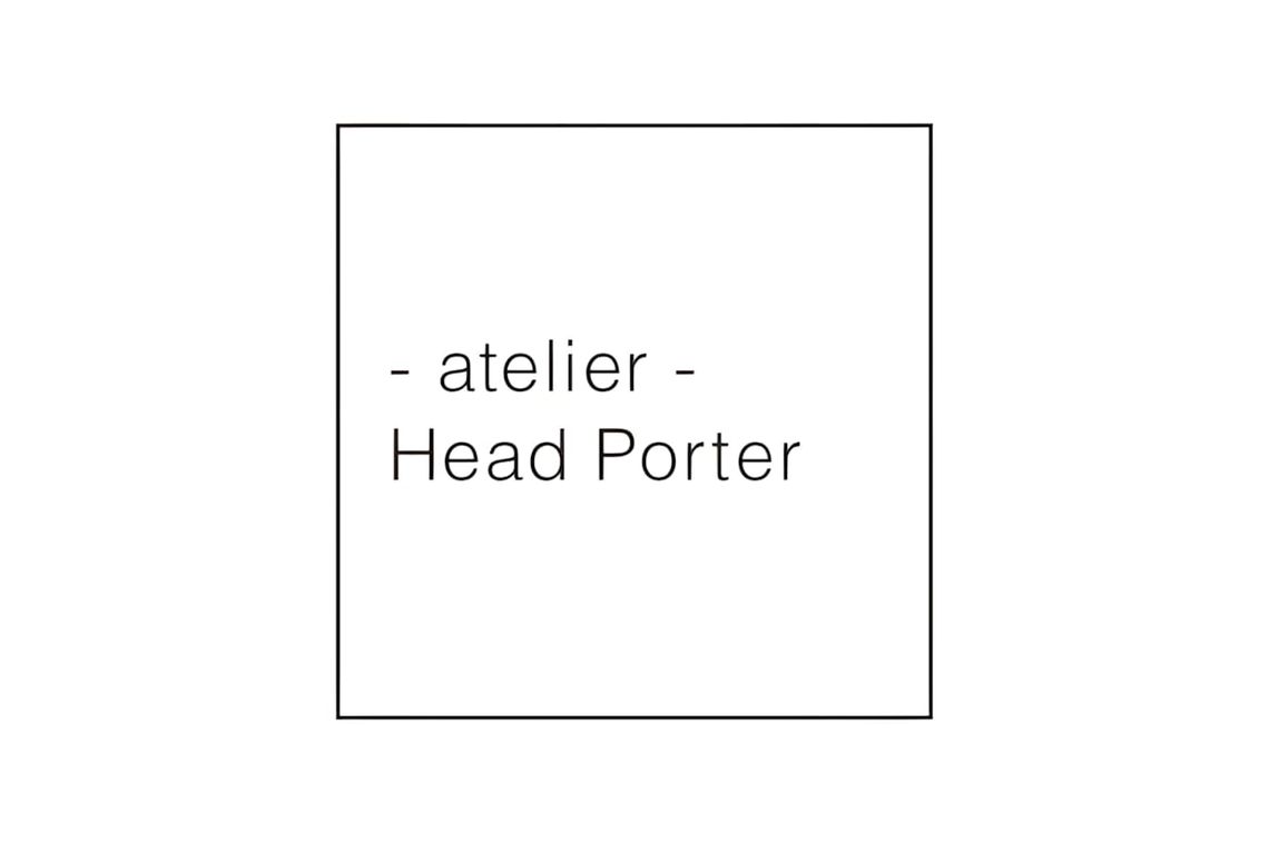 Typeset brand identity card reading '- atelier - Head Porter' in a thin-rule square border on white.