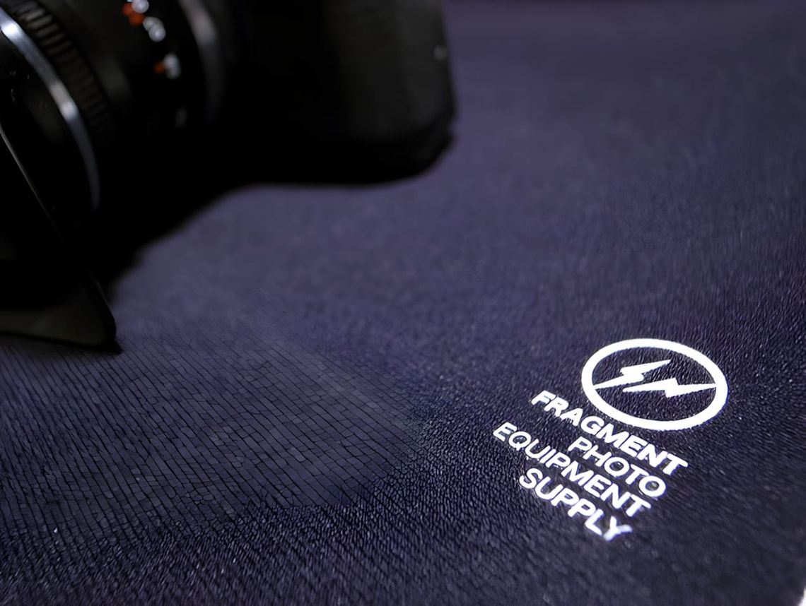 Fragment design Tech Wrap neoprene camera body wrap with lightning bolt logo by Hiroshi Fujiwara