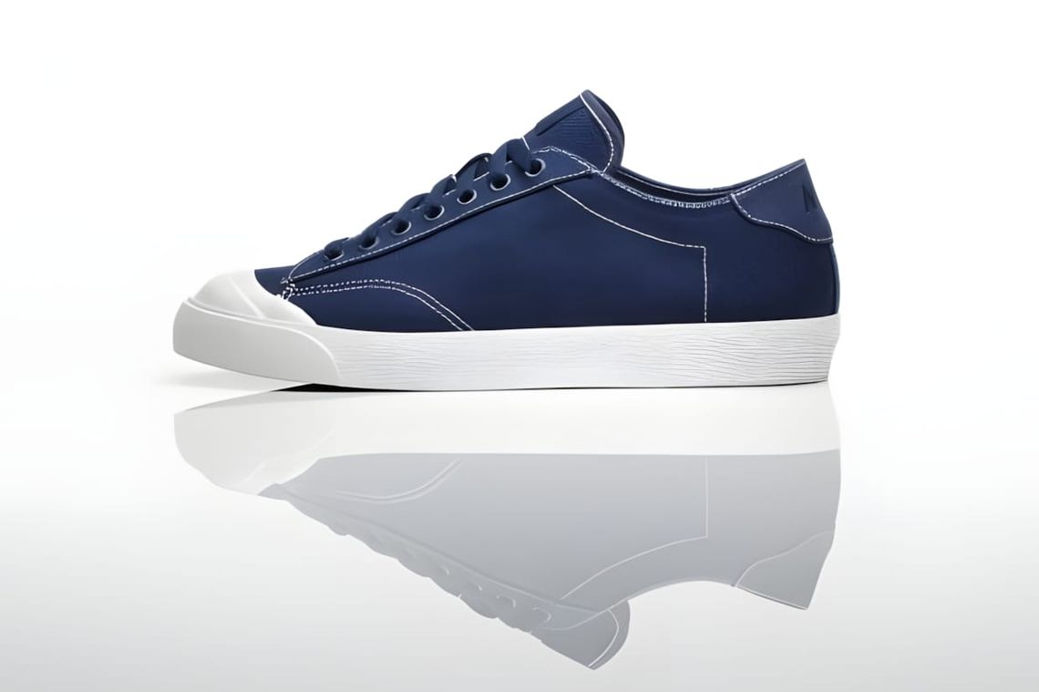 fragment design x Nike Zoom All Court 2 Low TZ in Midnight Navy — lateral profile view showing cotton canvas upper, white con