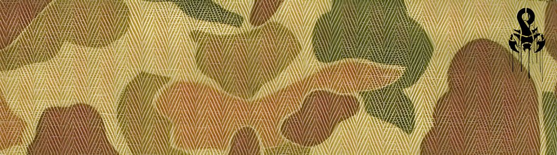 Close-up of WWII P44 frogskin camouflage herringbone twill fabric on the Warehouse & Co Lot 2193 USMC Parachutist Utility Jac