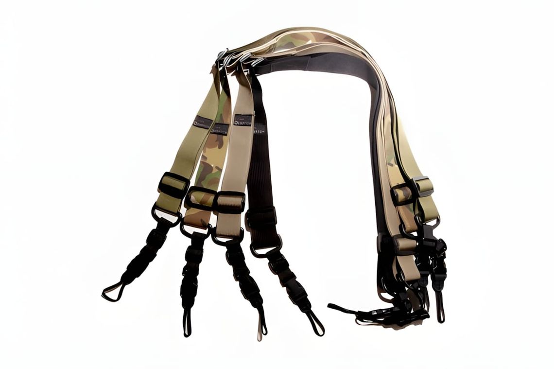 DSPTCH Heavy Camera Sling Strap in camo colorway — 1.5-inch mil-spec nylon webbing with flat-cord quick-release connectors, s