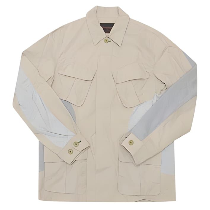 Snow Peak Nylon Washer Jacket flat-lay — ecru/tan nylon body with four chest and waist pockets and contrasting heather-grey k