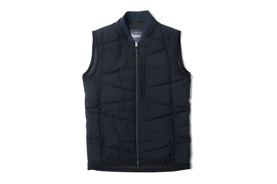Herno Laminar quilted vest in navy, ghost-mannequin shot, angular quilt pattern, full-length zip, Herno logo at chest.