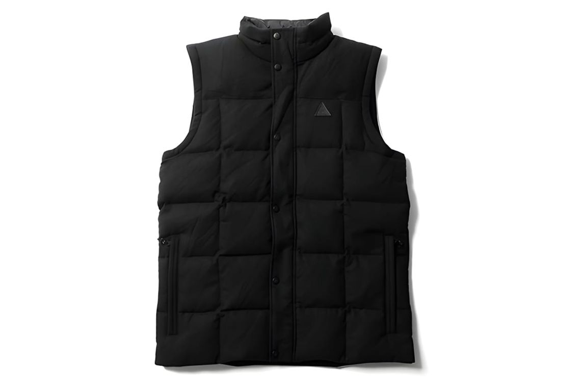 Nike ACG x Pendleton down puffer vest in black, flat-lay on white background. Virgin wool outer shell with quilted baffles, s
