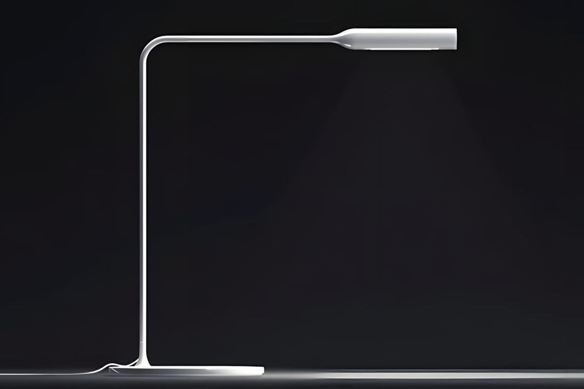 Flo desk lamp by Foster + Partners for Lumina — white aluminium cantilevered task lamp with flat rectangular base, vertical a