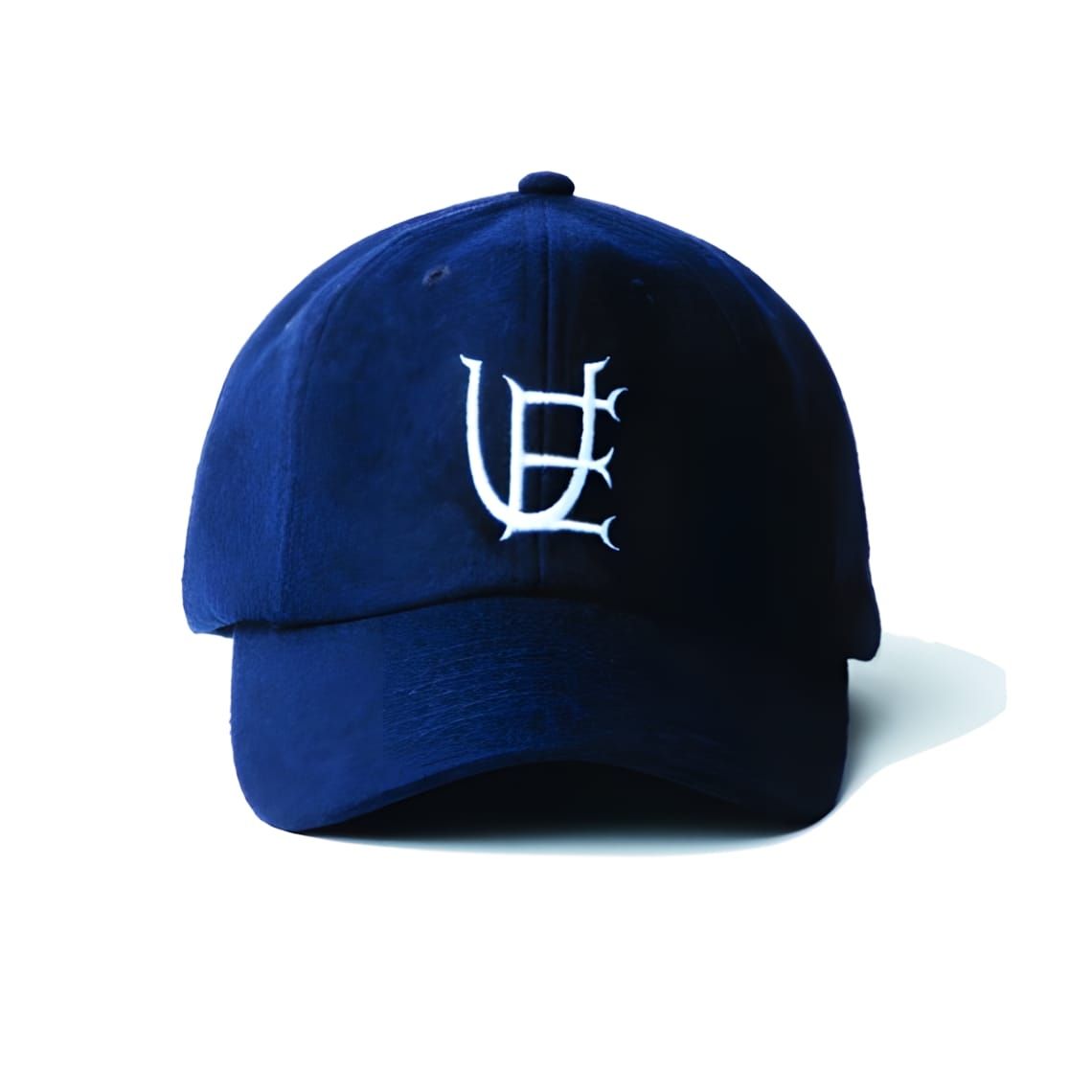 Navy wool New Era 9Fifty snapback cap with white embroidered interlocking UE monogram on the front panel, product shot on whi
