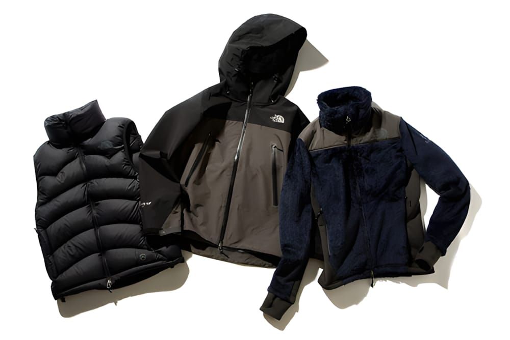 Taylor Design x TNF SS2009: black quilted down vest, charcoal Gore-Tex hard-shell with hood, navy textured fleece jacket, fla