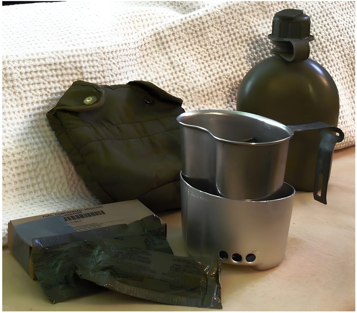 Rothco 4-piece canteen kit: aluminum cup, OD canvas cover, folding stove stand, and fuel tablets on tan surface.