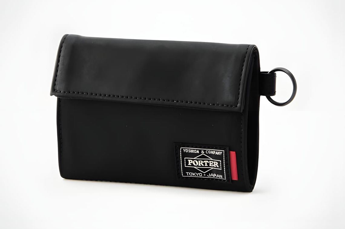 Porter ALOOF Fold Wallet (023-01084) in black calf leather on a white background, showing flap closure with topstitching, D-r