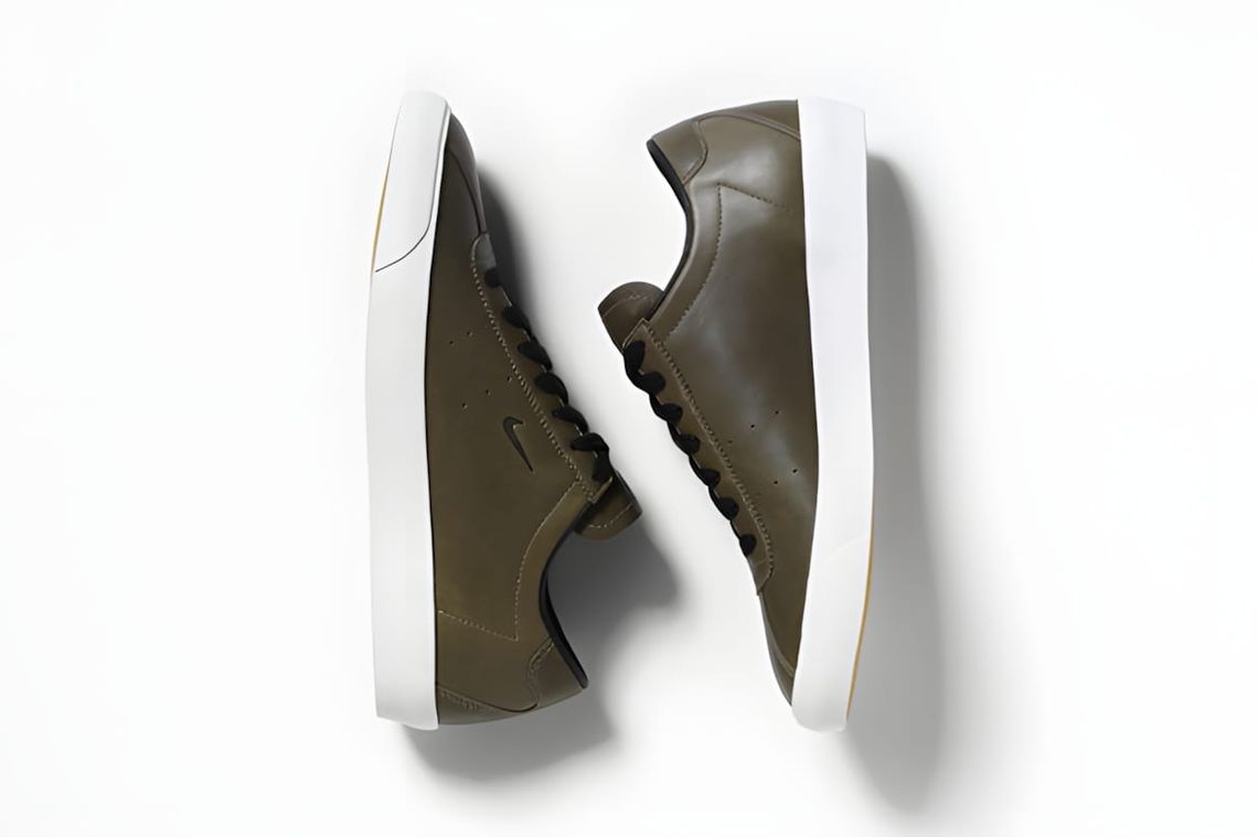 Nike Match Classic QS low-top court sneaker with leather upper and gum rubber sole, shown in a clean studio product shot.