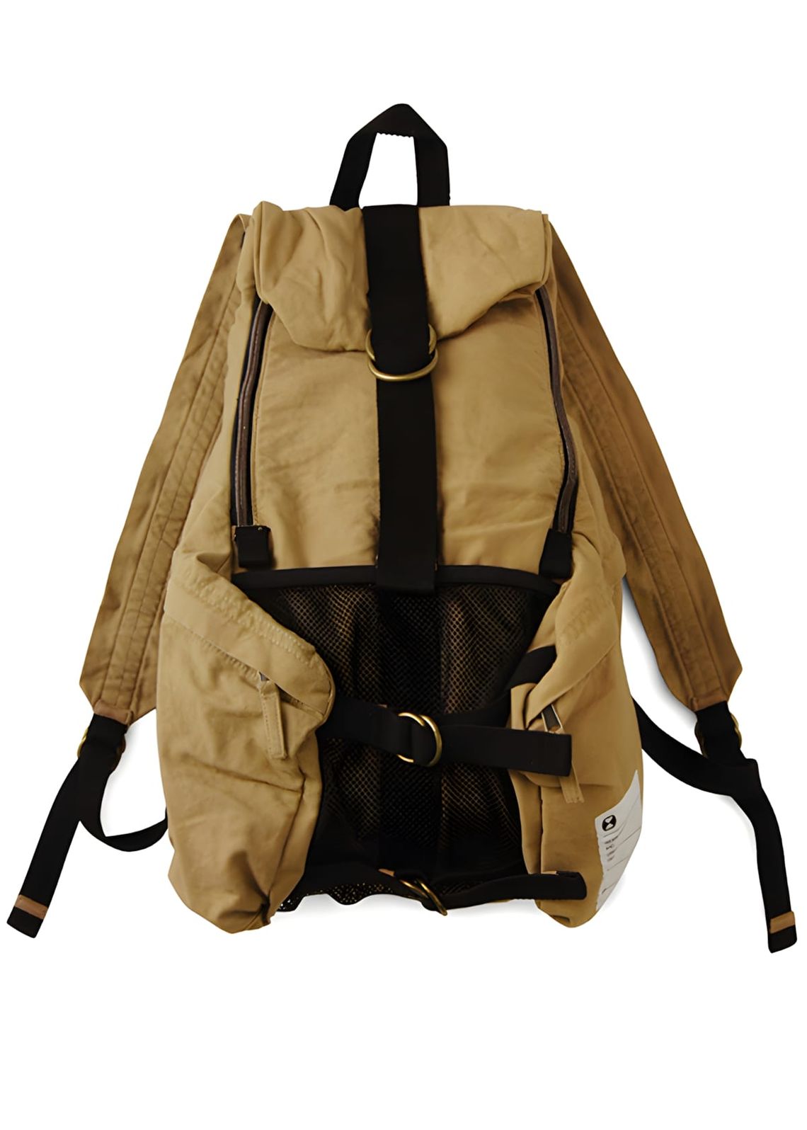 WTAPS khaki canvas backpack with brass D-rings, black webbing straps, and front mesh compression pocket.